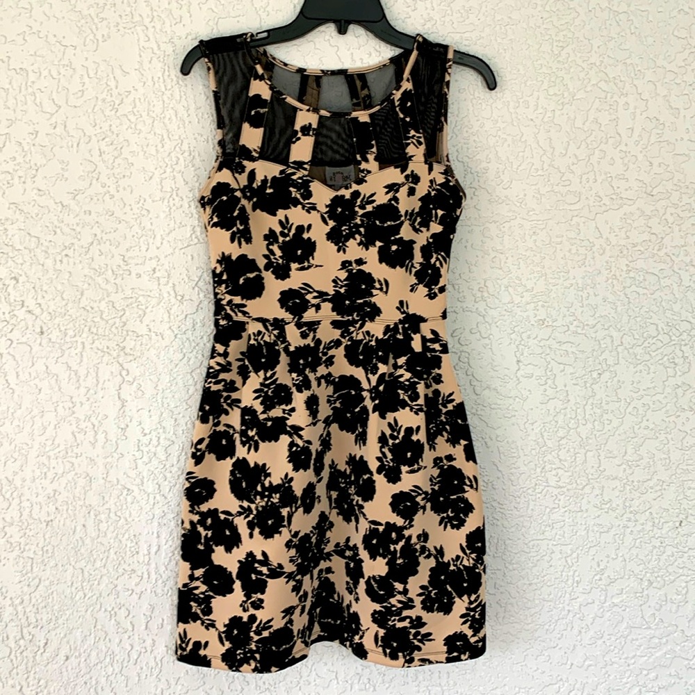Sweet Storm dress with lacy details on the top size m